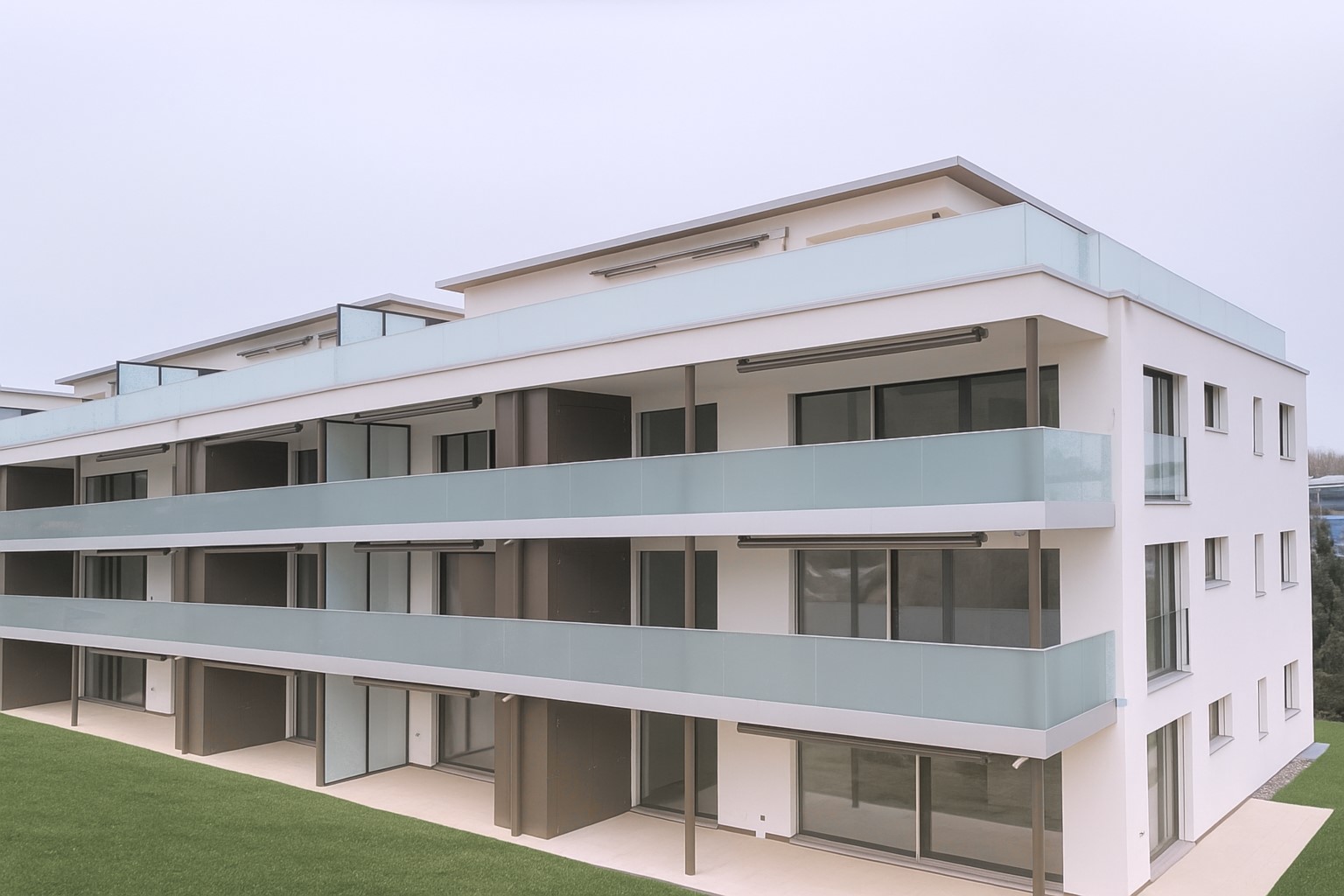 Ganz viel Glas, Wohnüberbauung in Schmitten